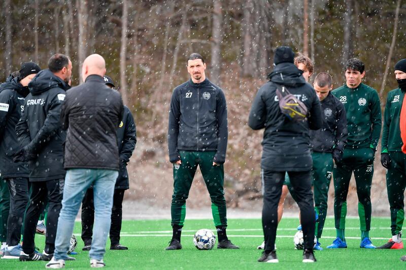 AC Milan's Zlatan Ibrahimovic, centre, at Arsta IP in Stockholm on Monday. AFP