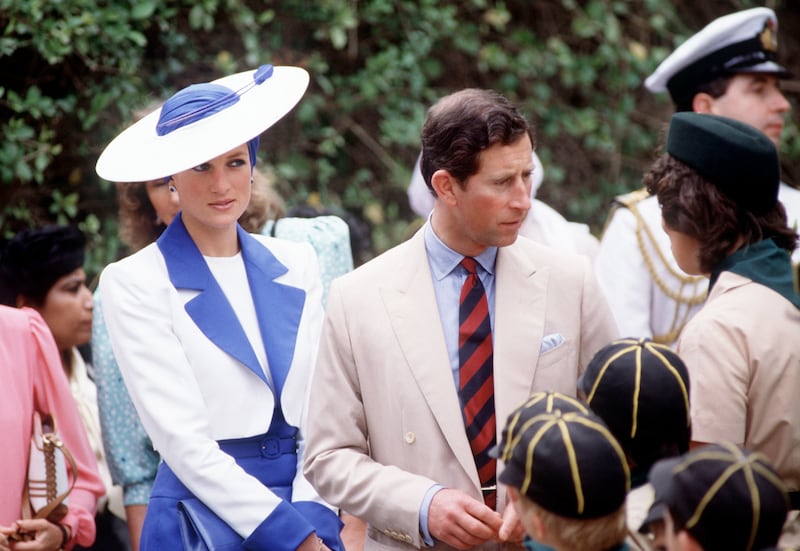 DUBAI, UNITED ARAB EMIRATES - MARCH 16:  The Prince And Princess Of Wales On A Walkabout In Dubai On The Gulf Tour. Diana's Outfit Is By Fashion Designer Catherine Walker And Hat By Milliner Philip Somerville.  (Photo by Tim Graham Photo Library via Getty Images)