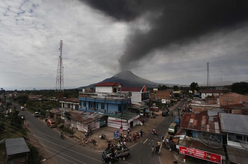 Mount Sinabung volcano during a fresh eruption today. Thousands of villagers fled after a series of volcanic eruptions on Indonesia's Sumatra island. Ade Sinujai / AFP Photo