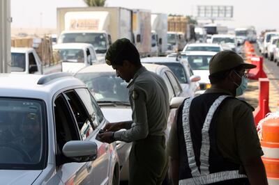 Saudi police check for identities and special Hajj permittions and visas as Saudi authorities is stopping any unauthorized for Hajj to get into Makkah, at the Shumais checkpoint few kilometers out of Makkah, Saudi Arabia on December 04, 2008. (Salah Malkawi/ The National)