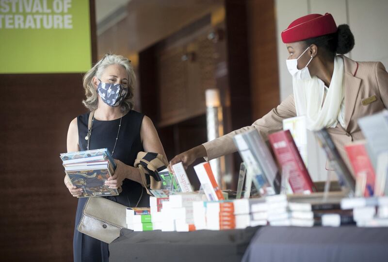 Duba, United Arab Emirates -  Book enthusiasts checking out books from different authors at the Emirates Airline Festival of Literature at InterContentinental Hotel Dubai Festival City.  Leslie Pableo for The National for Razmig's story