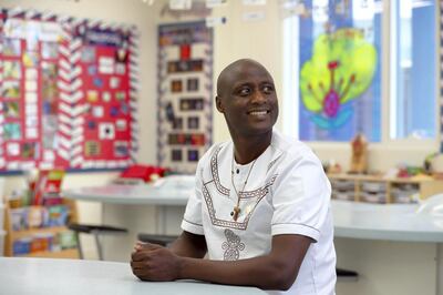 Dubai, United Arab Emirates - March 25, 2019: Portrait of Peter Tabichi, winner of the Global Teacher Prize. Monday the 25th of March 2019 GEMS Wellington in Dubai. Chris Whiteoak / The National