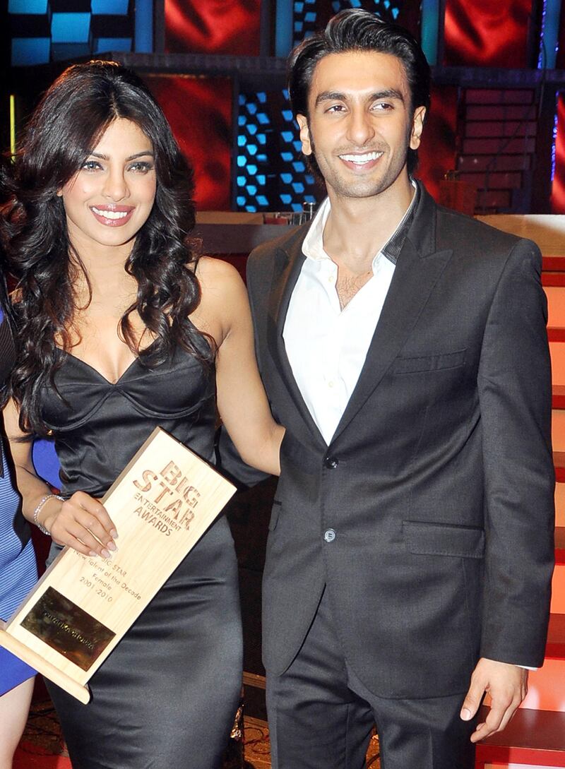 MUMBAI, INDIA - DECEMBER 21: Priyanka Chopra and Ranveer Singh at BIG STAR Entertainment Awards '10' at Bhavan's Ground, Andheri on December 21, 2010. (Photo by Yogen Shah/India Today Group/Getty Images) *** Local Caption *** Priyanka Chopra;Ranveer Singh al23ju-bolly-Chopra-Singh.jpg