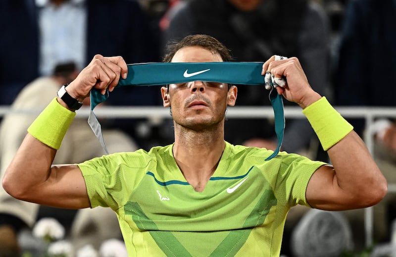 Spain's Rafael Nadal during a break against Serbia's Novak Djokovic during their men's quarter-final at the French Open tennis tournament at Roland Garros in Paris. AFP