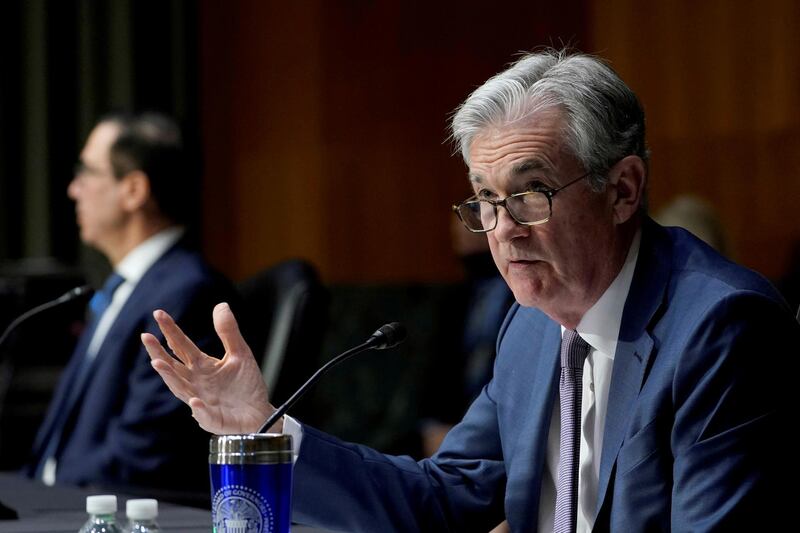 FILE PHOTO: Federal Reserve Chair Jerome Powell testifies before the Senate Banking Committee hearing on "The Quarterly CARES Act Report to Congress" on Capitol Hill in Washington, U.S., December 1, 2020. Susan Walsh/Pool via REUTERS/File Photo