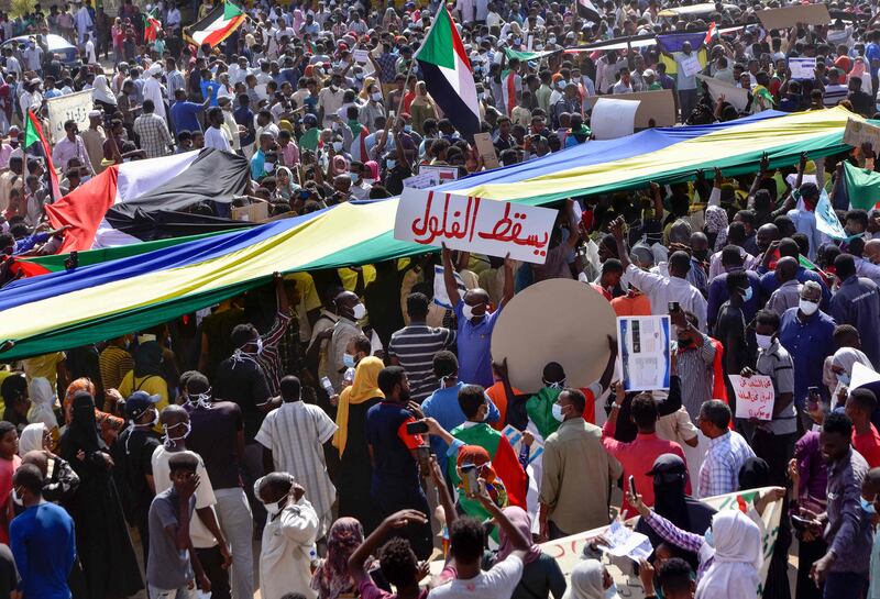 Sudanese demonstrators take part in a protest in the city of Khartoum Bahri, the northern twin city of the capital, to demand the government's transition to civilian rule. AFP