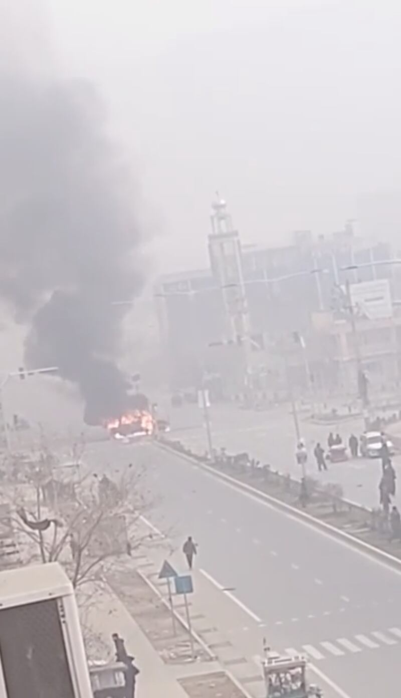 Smoke rises from fire on the street after explosion in Kabul, Afghanistan in this still image taken from social media video.  REUTERS