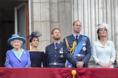 LONDON, ENGLAND - JULY 10: Queen Elizabeth II, Meghan, Duchess of Sussex, Prince Harry, Duke of Sussex, Prince William Duke of Cambridge and Catherine, Duchess of Cambridge watch the RAF 100th anniversary flypast from the balcony of Buckingham Palace on July 10, 2018 in London, England. (Photo by Paul Grover - WPA Pool/Getty Images)