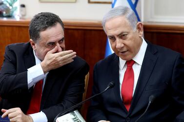 Israeli Prime Minister Benjamin Netanyahu speaks to to Foreign Minister Israel Katz during the weekly cabinet meeting in Jerusalem on October 27. Pool via Reuters, file