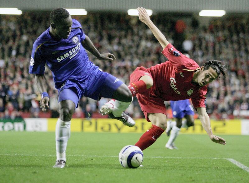LIVERPOOL, UNITED KINGDOM - SEPTEMBER 28:  Luis Garcia of Liverpool battles with Mickael Essien of Chelsea during the UEFA Champions League Group G match between Liverpool v Chelsea at Anfield on September 28, 2005 in Liverpool, England.  (Photo by Shaun Botterill/Getty Images)