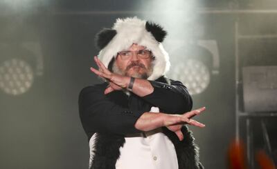 US actor Jack Black arrives on stage to accept the Comedic Genius award. AFP