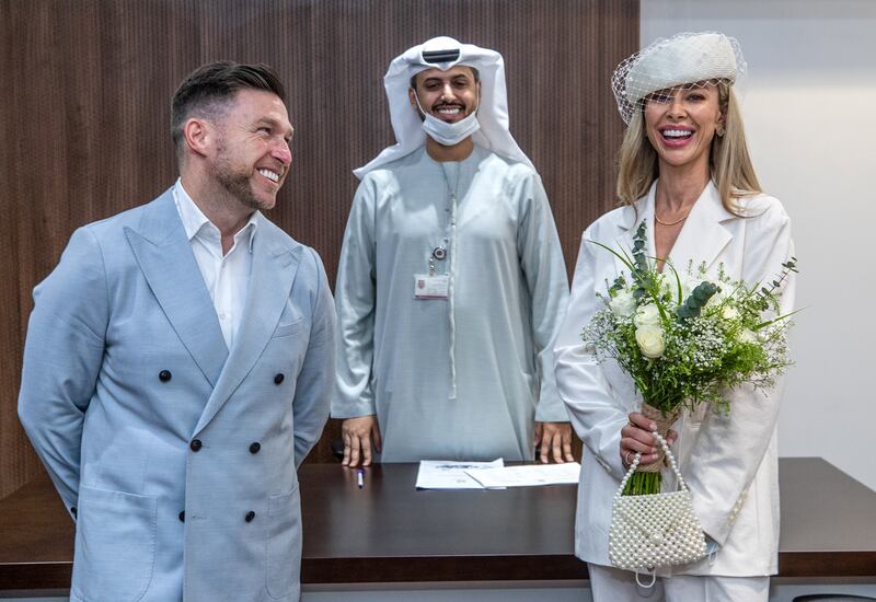 British couple Craig Lindsay and Sarah Goodman marry in a civil ceremony in February 2022. Victor Besa / The National