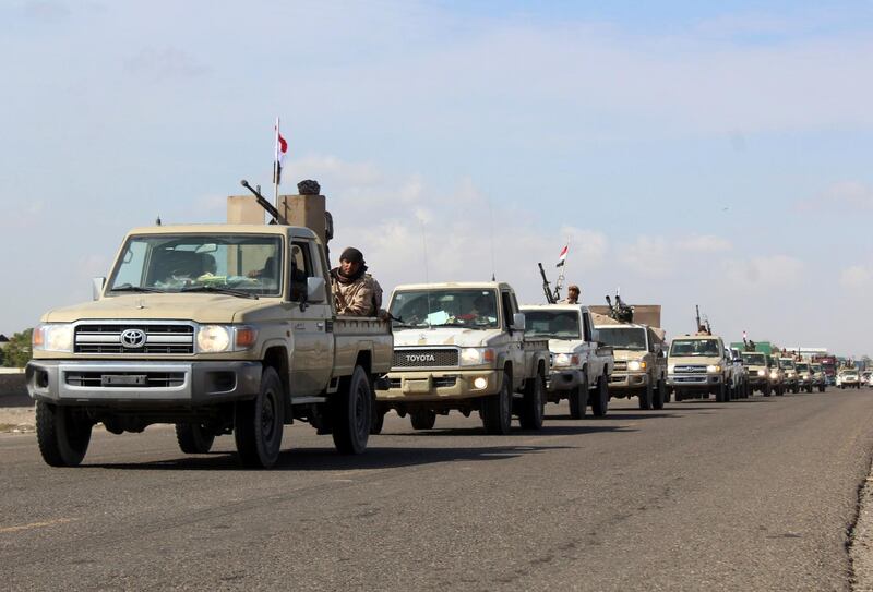 A reinforcement convoy of Yemen's Security Belt Force dominated by members of the the Southern Transitional Council (STC) seeking independence for southern Yemen, heads from the southern city of Aden to Abyan province on November 26, 2019, amid tensions with the forces of Saudi-backed President Abedrabbo Mansour Hadi. Saudi Arabia brokered on November 5 a power sharing agreement between Yemen's internationally recognised government and southern separatists of the STC, in a bid to end infighting that had distracted the Riyadh-led coalition from its battle against the Iran-backed Huthi rebels. / AFP / Saleh Al-OBEIDI
