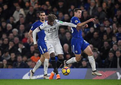 Soccer Football - Premier League - Chelsea vs Crystal Palace - Stamford Bridge, London, Britain - March 10, 2018   Crystal Palace's Wilfried Zaha in action with Chelsea's Cesar Azpilicueta    REUTERS/Toby Melville    EDITORIAL USE ONLY. No use with unauthorized audio, video, data, fixture lists, club/league logos or "live" services. Online in-match use limited to 75 images, no video emulation. No use in betting, games or single club/league/player publications.  Please contact your account representative for further details.