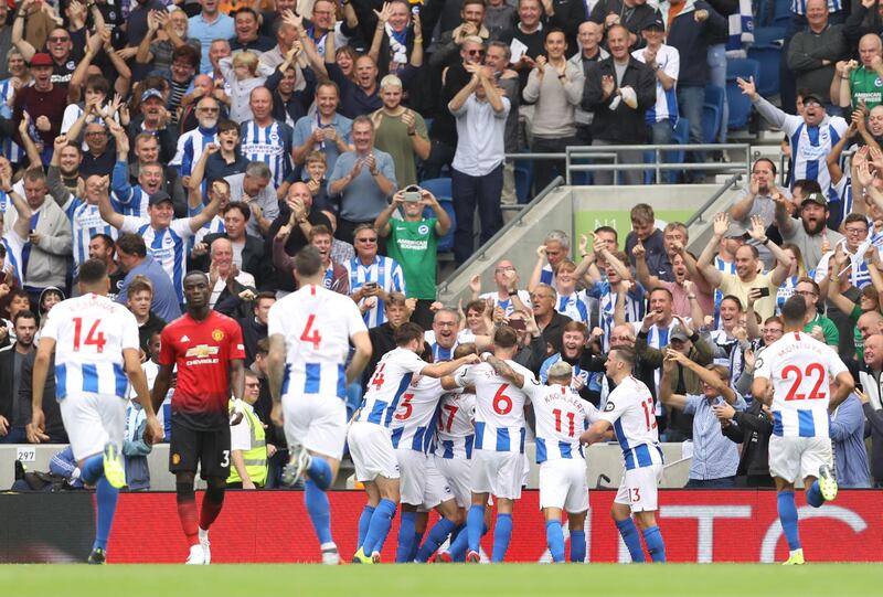 BRIGHTON, ENGLAND - AUGUST 19:  Glenn Murray of Brighton and Hove Albion celebrates with teammates after scoring his team's first goal during the Premier League match between Brighton & Hove Albion and Manchester United at American Express Community Stadium on August 19, 2018 in Brighton, United Kingdom.  (Photo by Dan Istitene/Getty Images)