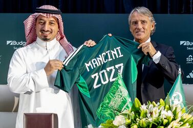 Soccer Football - Roberto Mancini signs as Saudi Arabia Coach - Fairmont Hotel, Riyadh, Saudi Arabia - August 28, 2023 New Saudi Arabia coach Roberto Mancini poses with Yasser Al-Misehal president of Saudi Arabia Football Federation during a press conference Saudi Arabia Football Federation/Handout via REUTERS  ATTENTION EDITORS - THIS IMAGE HAS BEEN SUPPLIED BY A THIRD PARTY.  NO RESALES.  NO ARCHIVES