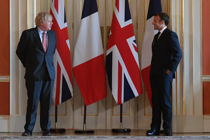 British Prime Minister Boris Johnson and French President Emmanuel Macron pose at 10 Downing Street. Getty Images