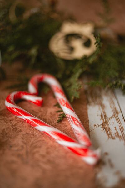 According to folklore, candy canes were invented to keep children quiet during Christmas Eve church service. Photo: Unsplash / Yana Gorbunova
