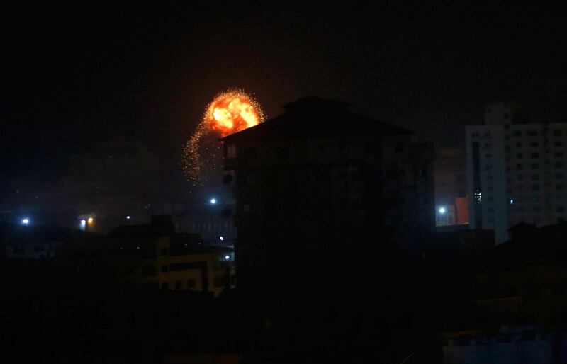 An explosion caused by Israeli airstrikes is seen in Gaza City. AP Photo