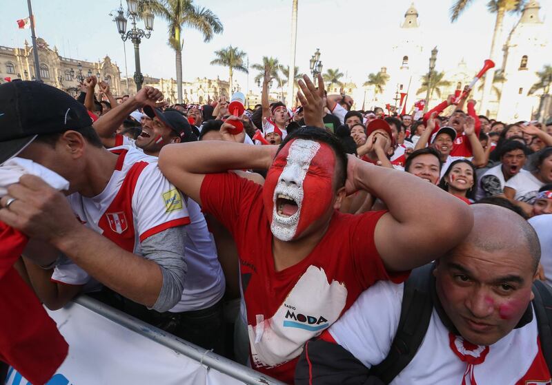 Peru's fans watching the game in Lima react to the defeat. AFP