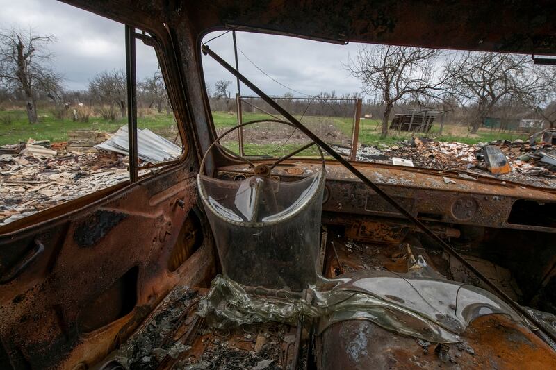 A view of a car destroyed by a military strike, during Russia's invasion in the village of Kukhari, in Kyiv region, Ukraine. Reuters