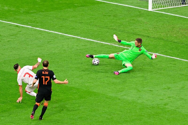 NETHERLANDS RATINGS: Maarten Stekelenburg - 7: Beaten in first 10 minutes but goal disallowed for offside. Beaten again but saved by his post 10 minutes later. Showed fine reactions to parry away a second-half Bardhi free-kick away. Getty