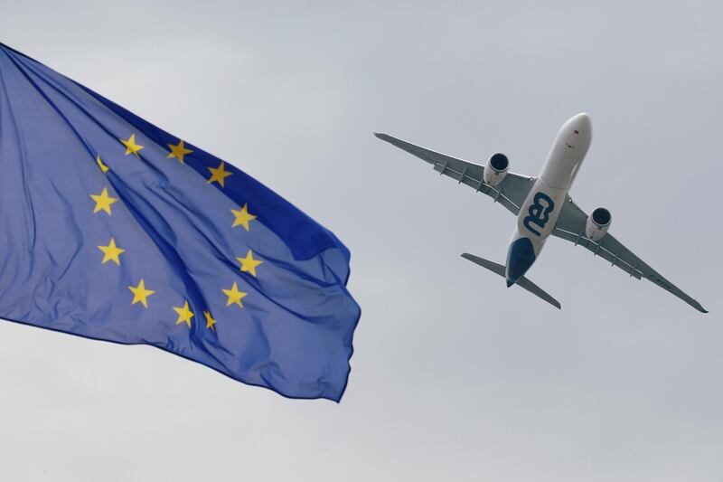 FILE PHOTO: An Airbus A330neo flies over the European flag as it performs at the 53rd International Paris Air Show at Le Bourget Airport near Paris, France June 23, 2019. REUTERS/Pascal Rossignol/File Photo