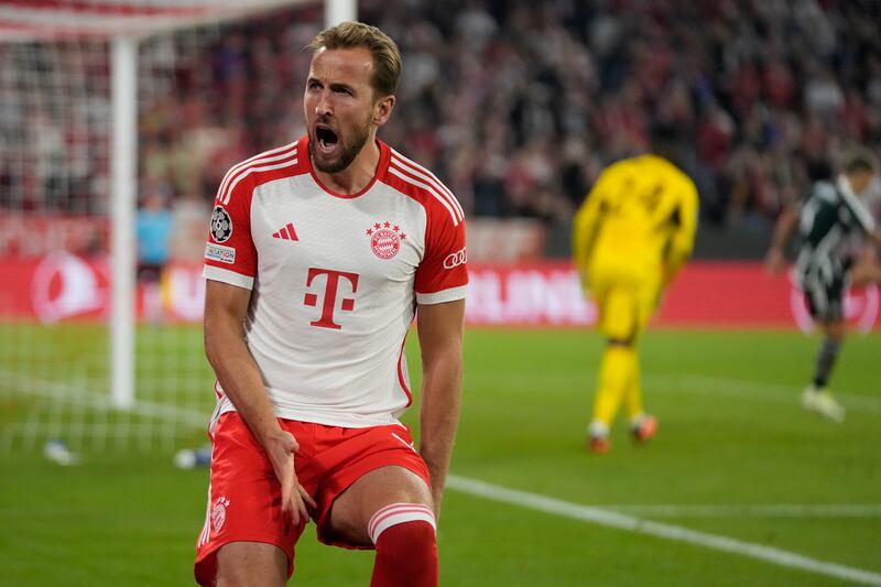 Bayern Munich's Harry Kane celebrates after scoring his side's third goal from the penalty spot in the Champions League Group A game against Manchester United at the Allianz Arena on Wednesday, September 20, 2023. AP 