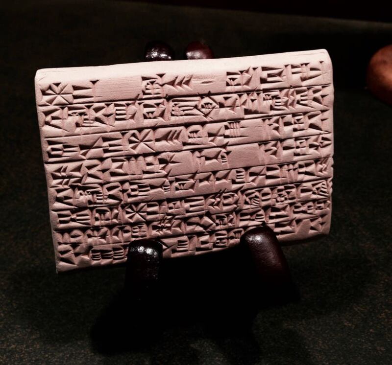 Clay tablet with a passage from the 'Epic of Gilgamesh', a poem from ancient Mesopotamia.