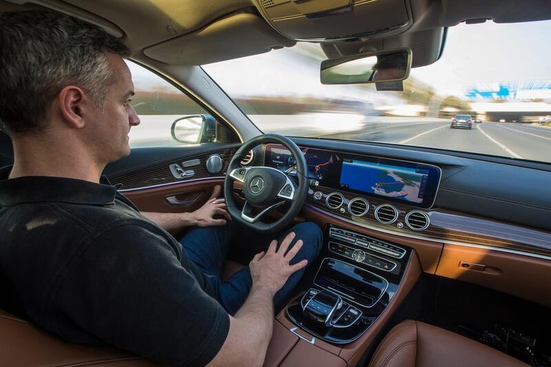 Dr Andreas Wedel is in the driver’s seat as the Mercedes E-300 makes its autonomous drive from Dubai to Abu Dhabi on the E11, in November. Courtesy Mercedes-Benz Cars Middle East.