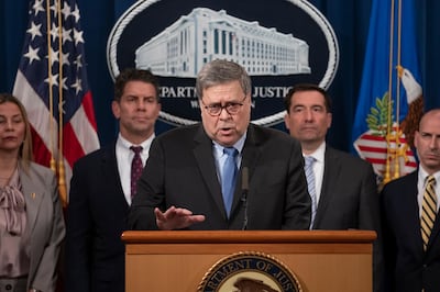 Attorney General William Barr, joined by FBI Deputy Director David Bowdich, second from left, and other officials, speaks to reporters at the Justice Department in Washington, Monday, Jan. 13, 2020, to announce results of an investigation of the shootings at the Pensacola Naval Air Station in Florida. On Dec. 6, 2019, 21-year-old Saudi Air Force officer, 2nd Lt. Mohammed Alshamrani, opened fire at the naval base in Pensacola, killing three U.S. sailors and injuring eight other people. (AP Photo/J. Scott Applewhite)