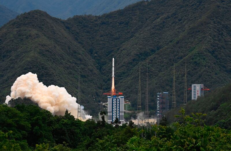 A Long March 2-C rocket carrying a satellite jointly developed by China and France, dubbed the Space Variable Objects Monitor, lifts off from a space base in Xichang, in China’s southwestern Sichuan province. AFP