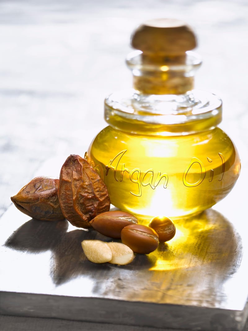 Bottle of argan oil and argan nuts. Getty Images