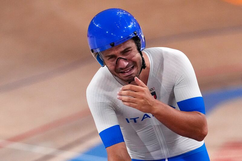 Francesco Lamon of Team Italy reacts after winning the gold medal during the track cycling men's team pursuit.