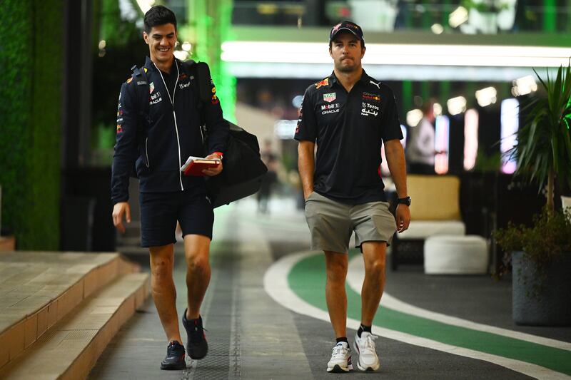 Sergio Perez of Mexico and Red Bull Racing leaves the paddock after a meeting attended by drivers, team principals, Stefano Domenicali and Ross Brawn. Getty
