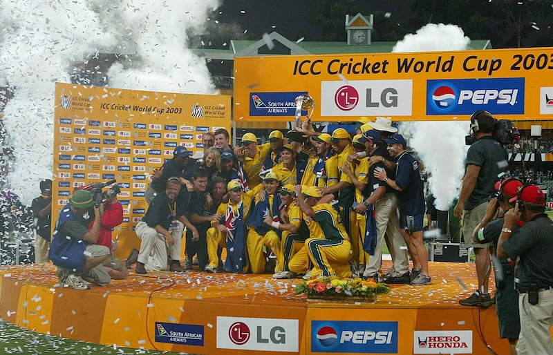 Australia's cricket teammate  celebrate with their trophy  23 March 2003 , at the final of the ICC World Cup , at the Wanderers Cricket grounds in Johannesburg.
AFP PHOTO YOAV LEMMER (Photo by YOAV LEMMER / AFP)