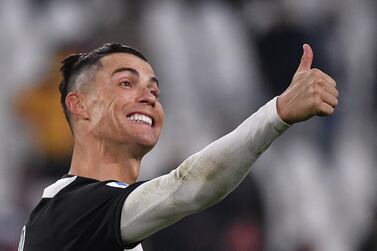 Juventus' Portuguese forward Cristiano Ronaldo celebrates during the Italian Serie A football match Juventus vs Cagliari on January 6, 2020 at the Juventus Allianz stadium in Turin. / AFP / Marco Bertorello