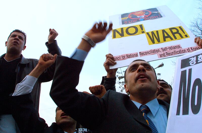 Muslim protesters at an anti-war rally in Seoul. 