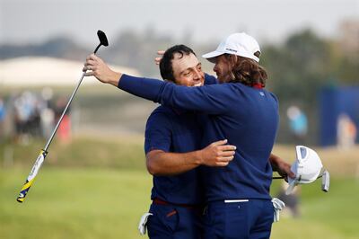 epa07054838 Tommy Fleetwood (R) of England and Francesco Molinari (L) of Italy celebrate their win by the 14th hole during the Ryder Cup 2018 at The Golf National in Guyancourt, near Paris, France, 28 September 2018.  EPA/IAN LANGSDON