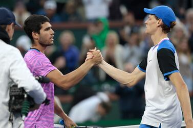 Carlos Alcaraz of Spain (L) greets Jannik Sinner of Italy (R) after winning match point  during the menâ€™s semifinal match at the BNP Paribas Open in Indian Wells, California, USA, 16 March 2024.   EPA/JOHN G.  MABANGLO