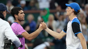 Carlos Alcaraz and Jannik Sinner greet each other at the net after their Indian Wells semi-final match. EPA