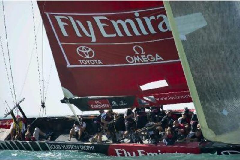 England cricketer Andrew Flintoff, bottom left, had an odd day out at sea as 18th man for Emirates Team New Zealand yesterday.