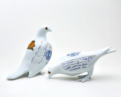 A handout photo of Suspended Together – (Standing Dove, Eating Dove) Manal al-­Dowayan, 2012, Porcelain,
20 x 10 x 23 cm eachat Home Ground exhibition at the Aga Khan Museum in Toronto (Photo by Miguel Veterano, Capital D Studio © Barjeel Art Foundation) NOTE: For Anna Seaman's feature in Arts & Life, July 2015