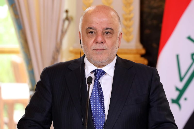 (FILES) This file photo taken on October 05, 2017 shows Iraqi Prime Minister Haider al-Abadi giving a press conference in Paris.
Abadi announced on December 9, 2017, "the end of the war" in Iraq against the Islamic State group and that his forces had regained full control of the border with Syria. / AFP PHOTO / POOL / ludovic MARIN