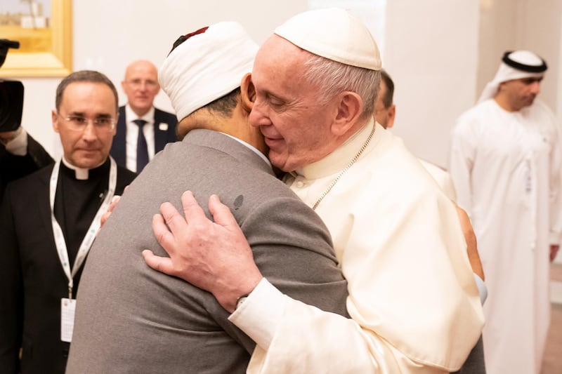 ABU DHABI, UNITED ARAB EMIRATES - February 3, 2019: Day one of the UAE Papal visit -  His Holiness Pope Francis, Head of the Catholic Church (R) greets His Eminence Dr Ahmad Al Tayyeb, Grand Imam of the Al Azhar Al Sharif (L), at the Presidential Airport. 

( Ryan Carter / Ministry of Presidential Affairs )
---
