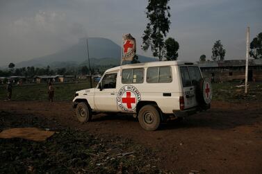 The Red Cross helping at a camp for displaced people. It says the pandemic has laid bare some truths in social and healthcare divisions. Ryan Carter for The National