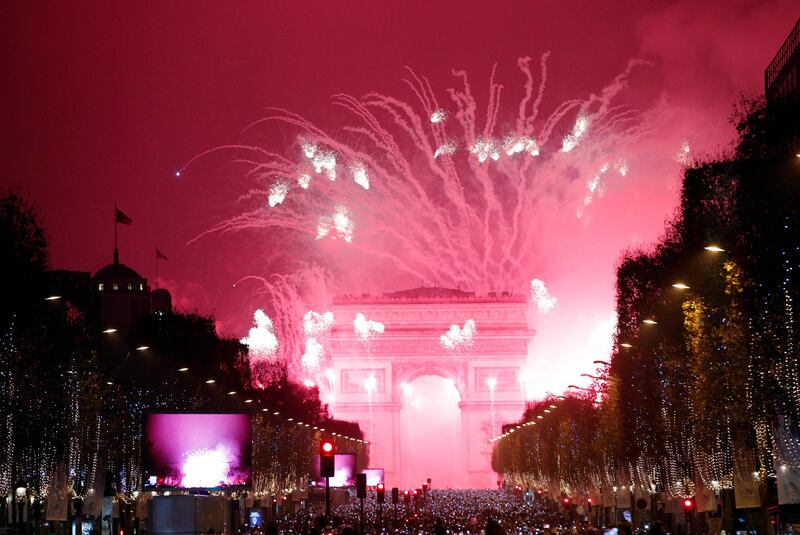 Fireworks illuminate the Arc de Triomphe during New Year's Eve celebrations on the Champs-Elysees in 2017. AP