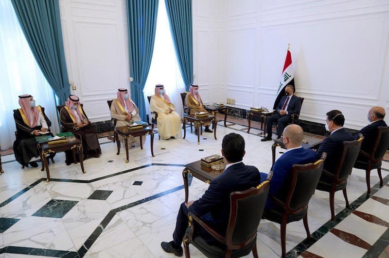 epa08628941 A handout photo made available by Iraqi prime minister's office shows Iraqi Prime Minister Mustafa Al-Kadhimi (C) meeting with Saudi Foreign Minister Prince Faisal bin Farhan Al-Saud (C-L) at his office in Baghdad, Iraq, 27 August 2020.  EPA/IRAQI PRIME MINISTER OFFICE HANDOUT  HANDOUT EDITORIAL USE ONLY/NO SALES