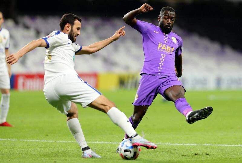 Al Ain, United Arab Emirates - Reporter: John McAuley: Ahmed Barman of Al Ain battles with Murod Khalmukhamedov of Bunyodkor. Al Ain take on Bunyodkor in the play-off to game qualify for the 2020 Asian Champions League. Tuesday, January 28th, 2020. Hazza bin Zayed Stadium, Al Ain. Chris Whiteoak / The National