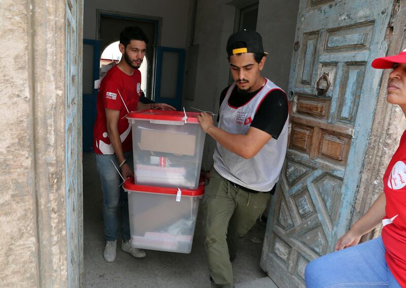 Workers of Tunisia's Independent High Authority for Elections (ISIE) dispatch ballot boxes to polling stations ahead of tomorrow's presidential election in Tunis, Tunisia. The first round of the presidential election in Tunisia will be held on 15 September.  EPA